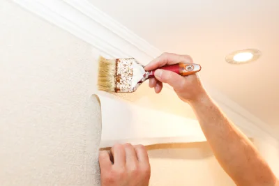 Pose de papier peint à Clans — revêtements muraux et toiles de verre